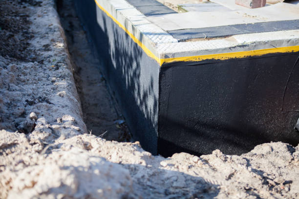 Professional Waterproofing technician working in Waterport, NY